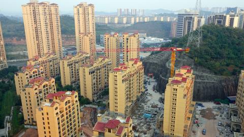 Commercial houses under construction in Yichang, Hubei Province, China, on October 18, 2023. (Photo by Costfoto/NurPhoto via Getty Images)