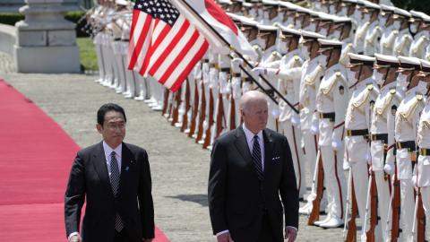 President Joe Biden reviews an honor guard with Japanese Prime Minister Fumio Kishida at the Akasaka State Guest House on May 23, 2022, in Tokyo, Japan. (Eugene Hoshiko via Getty Images)