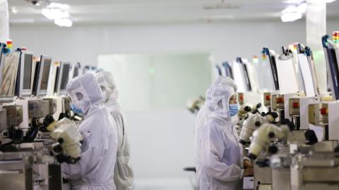 Workers at a production workshop of a chip manufacturing company in Suqian, China, on July 12, 2023. (Costfoto/NurPhoto via Getty Images)