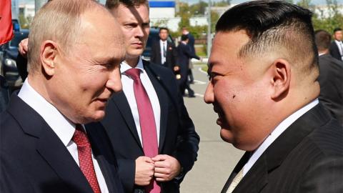 Russia's President Vladimir Putin shakes hands with North Korea's leader Kim Jong Un during their meeting in Amur Oblast, Russia, on September 13, 2023. (Vladimir Smirnov/POOL/AFP via Getty Images)
