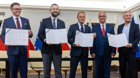 Szymon Holownia, Wladyslaw Kosiniak-Kamysz, Donald Tusk, Wlodzimierz Czarzasty, and Robert Biedron during the signing of the coalition agreement regarding the tasks of establishing a new government in Warsaw, Poland, on November 10, 2023. (Andrzej Iwanczuk/NurPhoto via Getty Images)