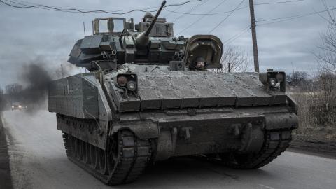 Ukrainian soldiers patrol with a Bradley Fighting vehicle as the Russia-Ukraine war continues in Avdiivka, Donbas, Ukraine, on December 4, 2023. (Marek M. Berezowski/Anadolu via Getty Images)