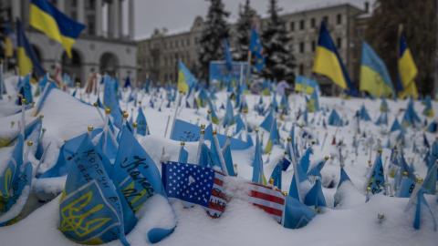 A makeshift memorial made of thousands of small flags with messages to those who have died in the war stands in the snow on December 8 2023, in Kyiv, Ukraine. (Ed Ram/For The Washington Post via Getty Images)