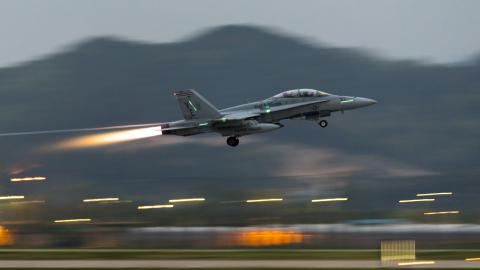 A US Marine Corps F/A-18D Hornet aircraft with Marine Fighter Attack Squadron 115 takes off from Gwangju Air Base, Republic of Korea, on April 19, 2023. (Tyler Harmon via DVIDS)