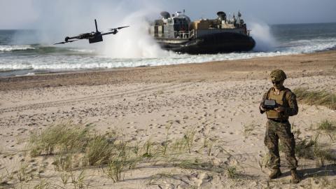 A U.S. Marine assigned to the Battalion Landing Team 1/6, 26th Marine Expeditionary Unit (Special Operations Capable) (26MEU(SOC)), pilots a Skydio Unmanned Aerial System during an amphibious landing for Northern Coast 2023 (NOCO 23) in Ventspils, Latvia, Sept. 12, 2023. NOCO 23 is a German-led multinational exercise that strengthens military and maritime combat readiness through realistic training in order to sharpen interoperability with our Allies and partners. The San Antonio-class amphibious ship USS M