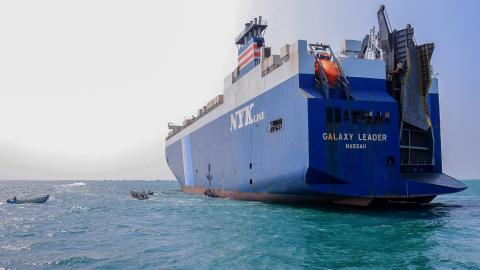 A picture taken during an organised tour by Yemen's Huthi rebels on November 22, 2023 shows the Galaxy Leader cargo ship, seized by Huthi fighters two days earlier, at a port on the Red Sea in Yemen's province of Hodeida. The Bahamas-flagged, British-owned Galaxy Leader, operated by a Japanese firm but having links to an Israeli businessman, was headed from Turkey to India when it was seized and re-routed to Hodeida November 19, according to maritime security company Ambrey. The Huthis said the capture was