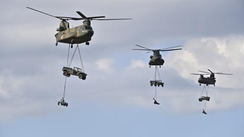 Japan's Self-Defense Forces 1st Airborne Brigade conduct descent training with allies US, UK, Canada, France, Germany, and Philippines on January 7, 2024, at Camp Narashino training area in Tokyo, Japan. (David Mareuil/Anadolu via Getty Images)