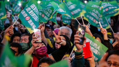 Supporters of Lai Ching-te, presidential candidate of Democratic Progressive Party (DPP), cheer during an election campaign rally in Keelung, Taiwan, on January 8, 2024. (I-Hwa Cheng/AFP via Getty Images)