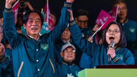 Democratic Progressive Party's presidential candidate Lai Ching-te and Taiwan's president Tsai Ing-wen cheer at the end of the campaign rally on January 11, 2024, in Taipei City, Taiwan. (Annabelle Chih via Getty Images)