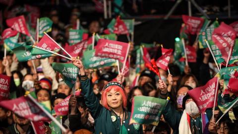 Supporters of Taiwan's Vice President and president-elect from the Democratic Progressive Party (DPP) Lai Ching-te wait for him to speak at the party's headquarters on January 13, 2024, in Taipei, Taiwan. (Annice Lyn via Getty Images)