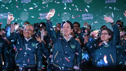 Confetti flies over the stage and crowd as Taiwan’s president- and vice president–elect Lai Ching-te and Hsiao Bi-khim speak to supporters at a rally at the party’s headquarters on January 13, 2024, in Taipei, Taiwan. (Photo by Annabelle Chih/Getty Images)