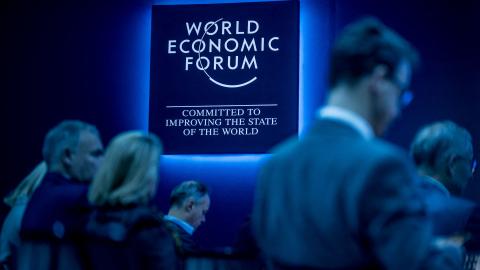 Participants wait for a session at the World Economic Forum annual meeting in Davos, Switzerland, on January 16, 2024. (Photo by Fabrice Coffrini/AFP via Getty Images)