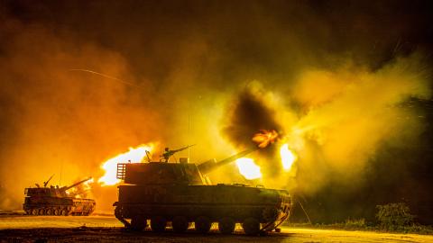 An artillery detachment conducts live fire at night in Huaibei city, Anhui province, China, July 10, 2023. (Photo by Costfoto/NurPhoto via Getty Images)