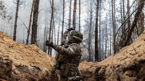  A Ukrainian soldier of the Khartia brigade throws a grenade from a trench during a training as the Russia-Ukraine war continues in Donetsk oblast, Ukraine, on February 7, 2024. (Photo by Diego Herrera Carcedo/Anadolu via Getty Images)