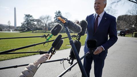 President Joe Biden stops to talk to journalists on his way to California to attend campaign receptions on February 20, 2024. (Chip Somodevilla via Getty Images)