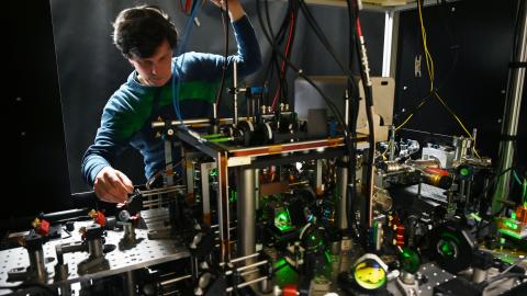 Florian Meinert, group leader at the 5th Institute of Physics at the University of Stuttgart, adjusts a neutral-atom quantum computer setup in the institute's laboratory on May 3, 2023. (Photo by Marijan Murat/picture alliance via Getty Images)