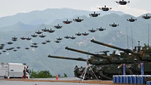 South Korean military drones fly in formation during a South Korea–US joint military drill at Seungjin Fire Training Field in Pocheon, South Korea, on May 25, 2023. (Yelim LEE / AFP via Getty Images)