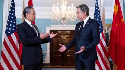 Secretary of State Antony Blinken speaks with Chinese Foreign Minister Wang Yi prior to meetings at the State Department in Washington, DC, on October 26, 2023. (Photo by Saul Loeb/AFP via Getty Images)