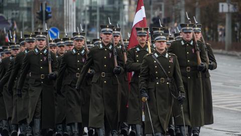 Latvian soldiers march during a military parade on Armed Forces Day 2023 in Vilnius. (Photo by Yauhen Yerchak/SOPA Images/LightRocket via Getty Images)