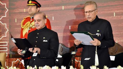 Pakistani President Arif Alvi administers the oath to newly sworn-in Prime Minister Shehbaz Sharif in Islamabad, Pakistan, on March 4, 2024. (Pakistan President House/AFP via Getty Images)