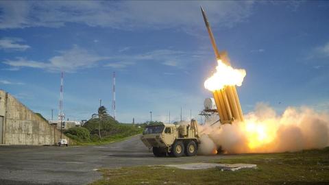 The first of two Terminal High Altitude Area Defense (THAAD) interceptors is launched during a successful intercept test on September 10, 2013. (Missile Defense Agency photo)