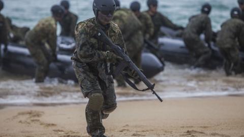 US Marines and Japanese Self-Defense Forces conduct boat operations in Okinawa, Japan, on April 28, 2015. (DVIDS)