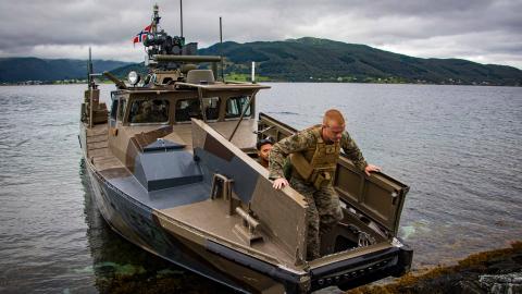 U.S. Marines assigned to the 26th Marine Expeditionary Unit (Special Operations Capable) (MEU(SOC)) disembark a Norwegian CB-90 class fast assault craft during a bilateral exercise in Narvik, Norway, Aug. 16, 2023. 