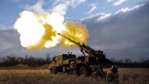 Ukrainian servicemen fire a French-made CAESAR self-propelled howitzer toward Russian positions in eastern Ukraine on December 28, 2022. (Photo by Sameer al-Doumy/AFP via Getty Images)