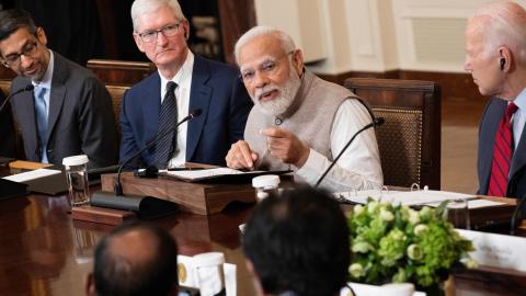Google CEO Sundar Pichai, Apple CEO Tim Cook, and US President Joe Biden look on as India's Prime Minister Narendra Modi speaks during a meeting with senior officials and CEOs of American and Indian companies in the White House on June 23, 2023. (Photo by Brendan Smialowski / AFP via Getty Images)