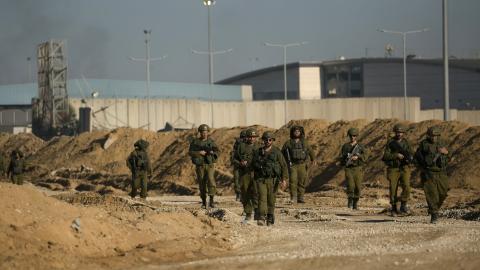 Israeli soldiers secure an area near the northern Gaza Strip on December 15, 2023. (Photo by Amir Levy/Getty Images)