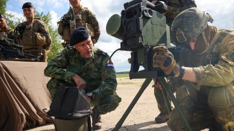 Admiral Rob Bauer, chair of the Military Committee of NATO, inspects the equipment of members of the German-French Brigade on July 10, 2023, in Gaiziunai, Lithuania. (Photo by Tim Ireland/Getty Images)