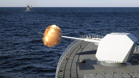 The main gun of Chinese guided-missile destroyer Nanchang attacks target during a China-Russia military drill on October 15, 2021, in Russia. (Sun Zifa/China News Service via Getty Images)