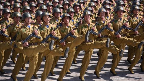 Korean People's Army (KPA) soldiers march during a mass rally on Kim Il Sung square in Pyongyang on September 9, 2018. North Korea held a military parade to mark its 70th birthday, but refrained from showing off the intercontinental ballistic missiles that have seen it hit with multiple international sanctions. (Photo by Ed JONES / AFP) (Photo by ED JONES/AFP via Getty Images)