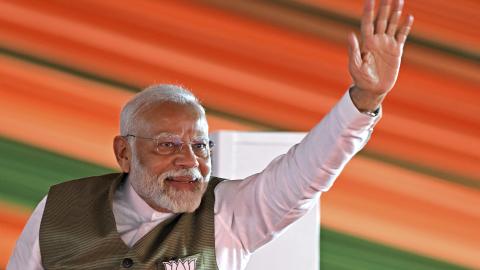 India's Prime Minister Narendra Modi waves to his supporters during a rally in Srinagar on September 19, 2024. (Tauseef Mustafa/AFP via Getty Images)