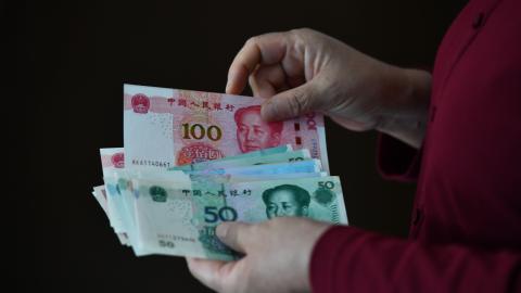 Chinese Yuan banknotes are pictured in Fuyang, China, on September 24, 2024. (Costfoto/NurPhoto via Getty Images)