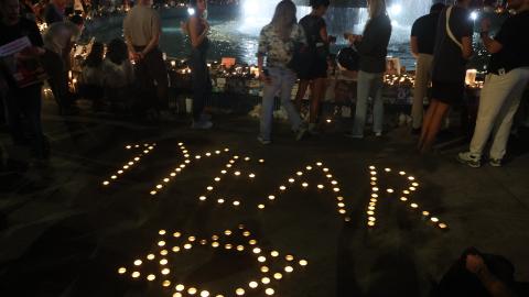 People gather to mark the first anniversary of the October 7 attacks in Tel Aviv on October 7, 2024. (Gil Cohen-Magen/AFP via Getty Images)
