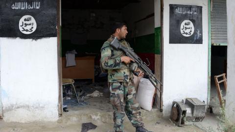Afghan security forces patrol during ongoing clashes between security forces and Islamic State militants in eastern Nangarhar province on July 26, 2016. (Noorullah Shirzada/AFP via Getty Images)