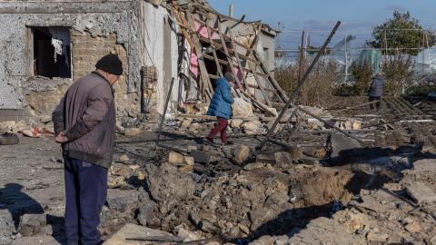 A local resident stands outside of a destroyed building following a missile attack in Odesa, Ukraine, on November 17, 2024. (Oleksandr Gimanov/AFP via Getty Images)