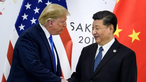 Xi Jinping shakes hands with Donald Trump at the G20 Summit in Osaka, Japan, on June 29, 2019. (Brendan Smialowski/AFP via Getty Images)