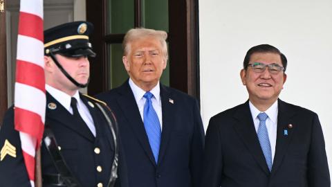 President Donald Trump greets Prime Minister Shigeru Ishiba upon arrival outside the White House in Washington, DC, on February 7, 2025. (Mandel Ngan/AFP via Getty Images)