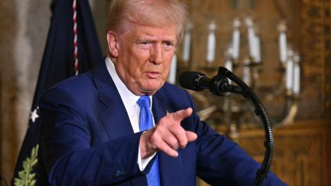 US President Donald Trump speaks during signing of executive orders at his Mar-a-Lago resort in Palm Beach, Florida, on February 18, 2025. (Photo by ROBERTO SCHMIDT / AFP) (Photo by ROBERTO SCHMIDT/AFP via Getty Images)