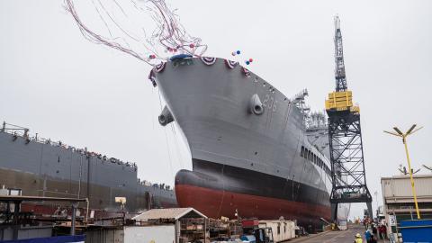 USNS Harvey Milk departs the General Dynamics NASSCO shipyard after a ceremonial address in San Diego, California on November 6, 2021. (AFP via Getty Images)