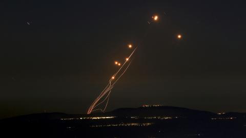 Rockets fired from southern Lebanon are intercepted by Israel's Iron Dome air defence system over the Upper Galilee region in northern Israel on September 27, 2024. (Jalaa Marey/AFP via Getty Images)