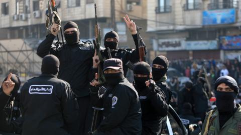 Security forces reporting to Syria's transitional government patrol the streets of Dummar, during an operation to seize weapons and hunt down armed supporters of the ousted Assad leadership on January 15, 2025. (Bakr Alkasem/AFP via Getty Images)