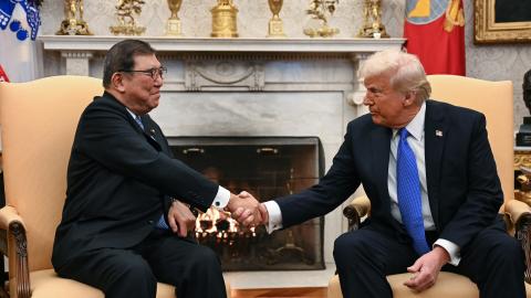 US President Donald Trump shakes hands with with Japanese Prime Minister Shigeru Ishiba in the Oval Office of the White House in Washington, DC, on February 7, 2025. (Photo by Jim WATSON / AFP) (Photo by JIM WATSON/AFP via Getty Images)