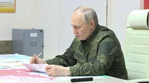 A screen grab from a video shows Russian President Vladimir Putin, dressed in military uniform, visiting a command post in Kursk, Russia, on March 12, 2025. (Kremlin Press Office via Getty Images)