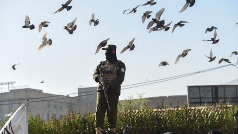 A Taliban security personnel stands guard outside the Shah-Do Shamshira Mosque during Eid al-Fitr prayers, which marks the end of the holy fasting month of Ramadan in Kabul on March 30, 2025. (Photo by Ahmad SAHEL ARMAN / AFP) (Photo by AHMAD SAHEL ARMAN/AFP via Getty Images)