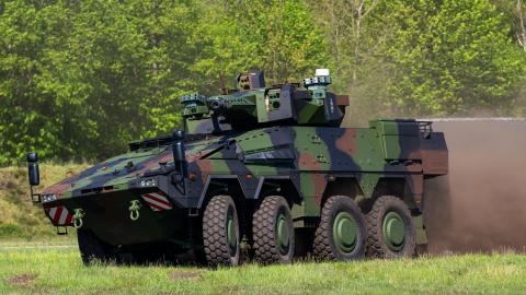 A Boxer wheeled armored infantry vehicle of the German armed forces drives across the Rheinmetall site. The Rheinmetall armaments group has been commissioned to supply the 123 Boxer vehicles with 123 Boxer vehicles with 30mm automatic cannon. Photo: Philipp Schulze/dpa (Photo by Philipp Schulze/picture alliance via Getty Images)