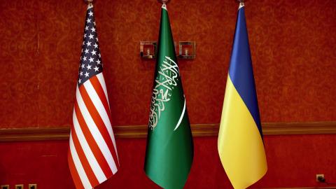 The flags of the United States, Saudi Arabia, and Ukraine are seen prior to talks on March 11, 2025, in Jeddah, Saudi Arabia. (Salah Malkawi via Getty Images)