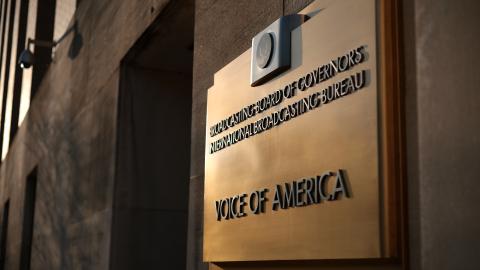 The Voice of America (VOA) sign is displayed on its building on March 17, 2025, in Washington, DC. (Alex Wong via Getty Images)
